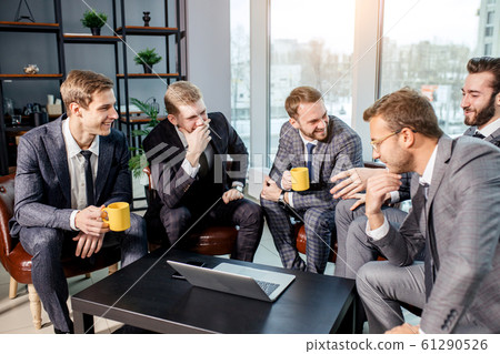 leisure time of male business team in office 61290526