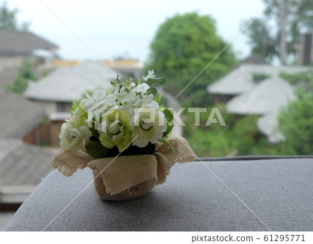 Bouquet decorate flowers in hay basket Bouquet decorate flowers in hay basket 61295771