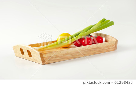 Wooden serving tray wit fresh vegetables and fruit Wooden serving tray wit fresh vegetables and fruit 61298483