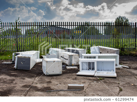 Several discarded fly-tipped fridges and freezers 61299474