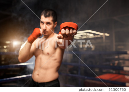 angry boxer man in fight 61300760