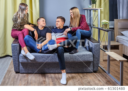 Two couples in love met in the apartment. Two couples in love met in the apartment. 61301480