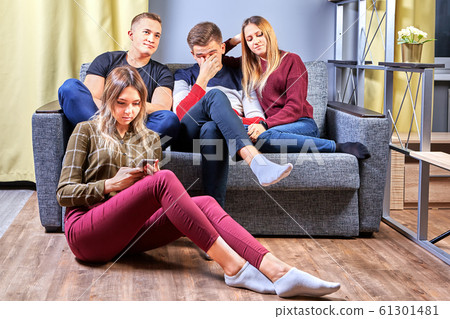 Two young couples met at the apartment. Two young couples met at the apartment. 61301481