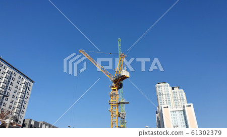 Tower crane at construction site Tower crane at construction site 61302379