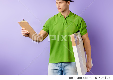portrait of caucasian delivery man holding pizza portrait of caucasian delivery man holding pizza 61304198