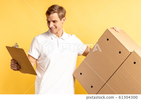 portrait of young delivery man 61304300