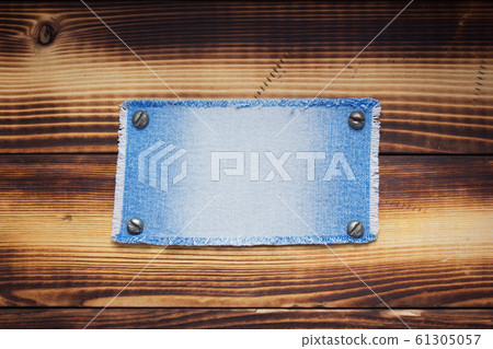 blue jeans texture on wooden background blue jeans texture on wooden background 61305057