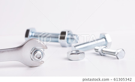 Industrial still life of nuts and bolts and Industrial still life of nuts and bolts and 61305342