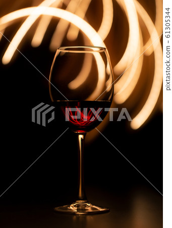 Abstract still life with a glass of wine. Abstract still life with a glass of wine. 61305344