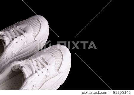 White running shoes. White running shoes. 61305345