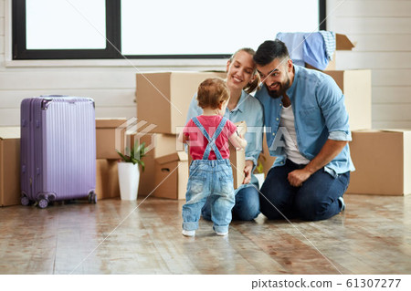 Caucasian family move in new house Caucasian family move in new house 61307277