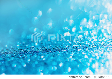 Defocused blue glitter background. blue abstract 61308682