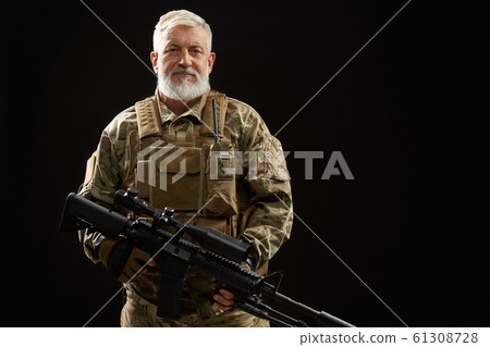 Old military officer holding sniper rifle. Old military officer holding sniper rifle. 61308728