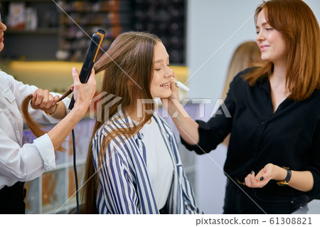 young model came in beauty saloon for hair dyeing or cutting young model came in beauty saloon for hair dyeing or cutting 61308821