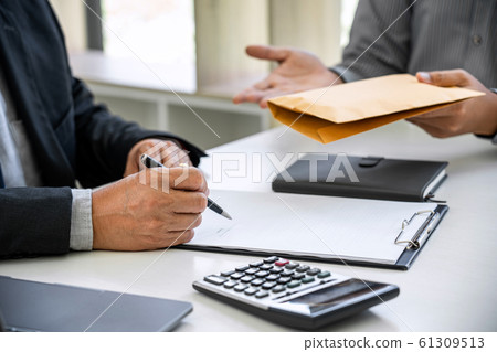 Bribery and corruption concept, bribe in the form Bribery and corruption concept, bribe in the form 61309513
