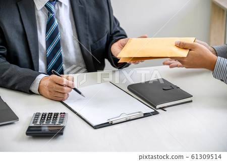 Bribery and corruption concept, bribe in the form Bribery and corruption concept, bribe in the form 61309514