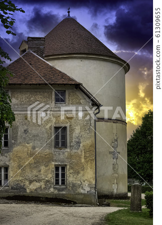 Dramatic sunrise over Coupvray Castle (Chateau de Coupvray) in Coupvray, Seine-et-Marne, France Dramatic sunrise over Coupvray Castle (Chateau de Coupvray) in Coupvray, Seine-et-Marne, France 61309655