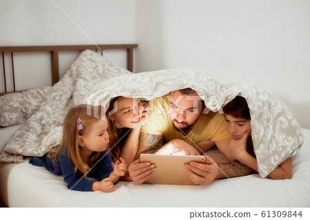 beautiful family enjoy spending time together at home beautiful family enjoy spending time together at home 61309844