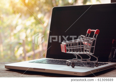Shopping online concept - Empty shopping cart or 61309889