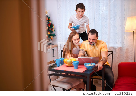wife and husband with kids at home wife and husband with kids at home 61310232