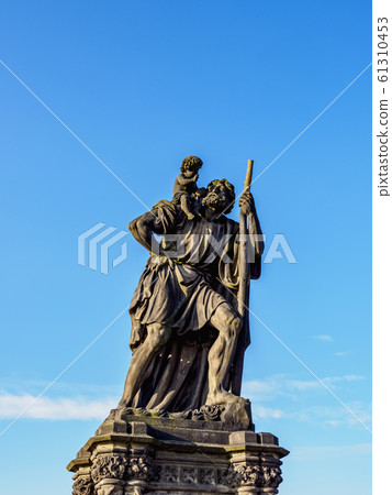 Sculpture at Charles Bridge in Prague 61310453