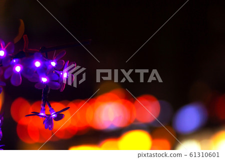 Soft focus, lights festive decorations of city Soft focus, lights festive decorations of city 61310601