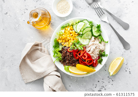 Chicken meat lunch bowl with fresh salad leaves, 61311575