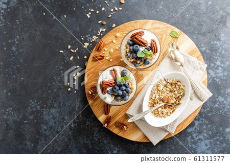 Blueberry parfait with ricotta cheese, granola and 61311577