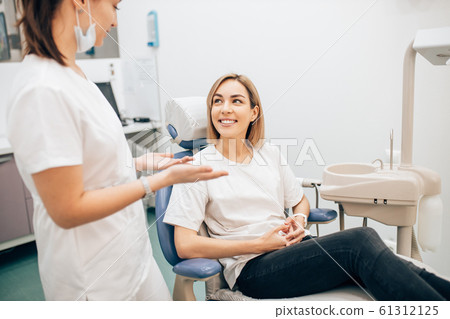 young female listen to doctor's recommendations 61312125