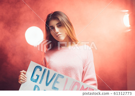 young caucasian woman feminist fighting for female power young caucasian woman feminist fighting for female power 61312773