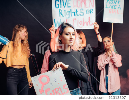 Feminism concept. caucasian young women fight together for feminism Feminism concept. caucasian young women fight together for feminism 61312807