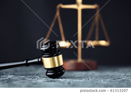 Judge gavel with Justice lawyers having team meeting at law 61313207