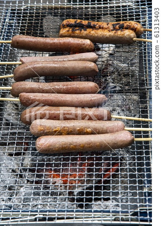 Sausage bake over charcoal 61313403
