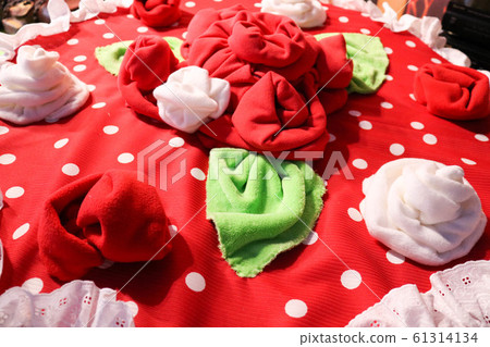 Red and white soft flowers of cloth in the form Red and white soft flowers of cloth in the form 61314134