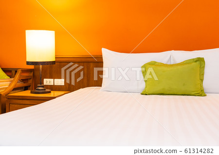 White comfortable pillow on bed decoration interior 61314282