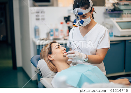 teeth treating by professional doctor teeth treating by professional doctor 61314746