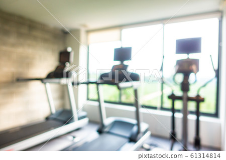 Abstract blur gym room interior with fitness equipment Abstract blur gym room interior with fitness equipment 61314814