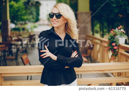 businesswoman in a city businesswoman in a city 61318770