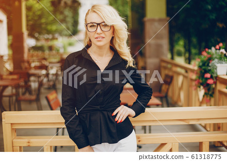 businesswoman in a city businesswoman in a city 61318775