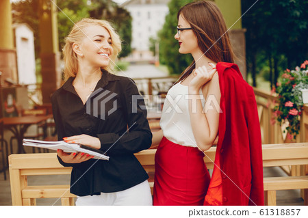 Businesswoman in a park Businesswoman in a park 61318857