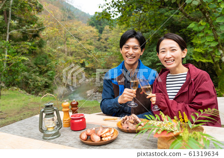 Couple barbecue camping outdoor image Couple barbecue camping outdoor image 61319634