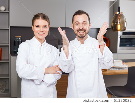 Two confident chefs Two confident chefs 61320022