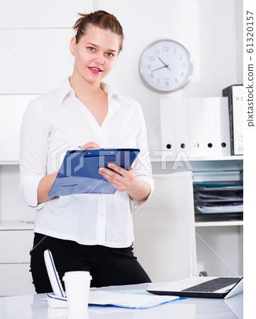 Businesswoman is signing contract 61320157