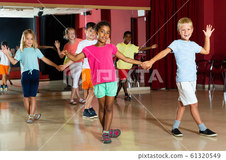 Nice children trying dancing partner dance Nice children trying dancing partner dance 61320549
