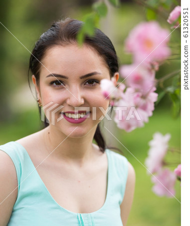 Summer happy smiling girl portrait outside in park Summer happy smiling girl portrait outside in park 61320551