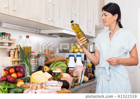 Portrait of cheerful woman with oil Portrait of cheerful woman with oil 61322319