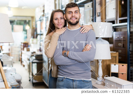 Couple in antique furnishings store Couple in antique furnishings store 61322385