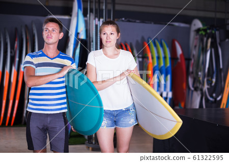 Couple with new surfboard Couple with new surfboard 61322595