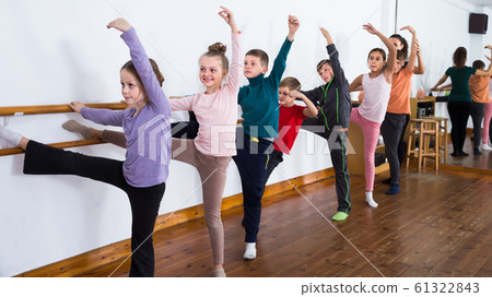 friendly children rehearsing ballet dance in studio friendly children rehearsing ballet dance in studio 61322843
