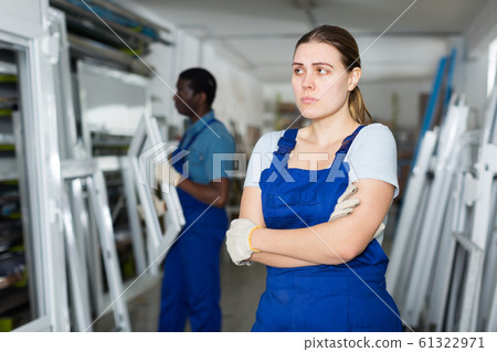 Portrait of sad woman worker who is standing Portrait of sad woman worker who is standing 61322971